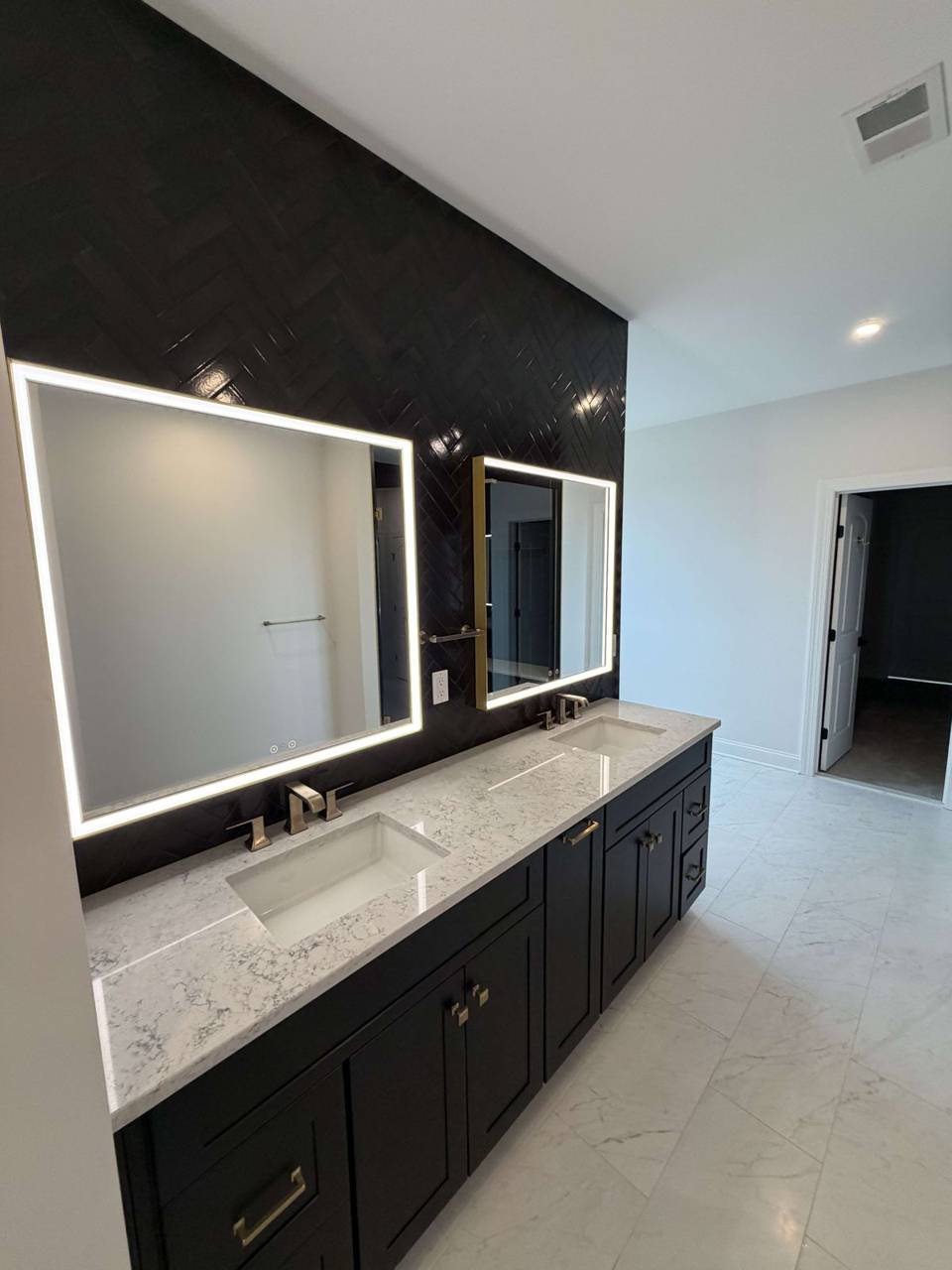 Bathroom with black vanity