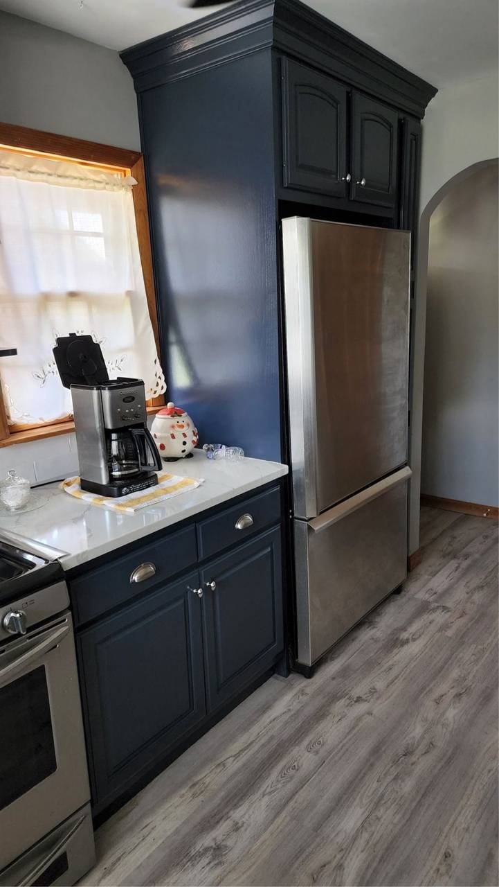 Kitchen cabinets refinished in deep navy