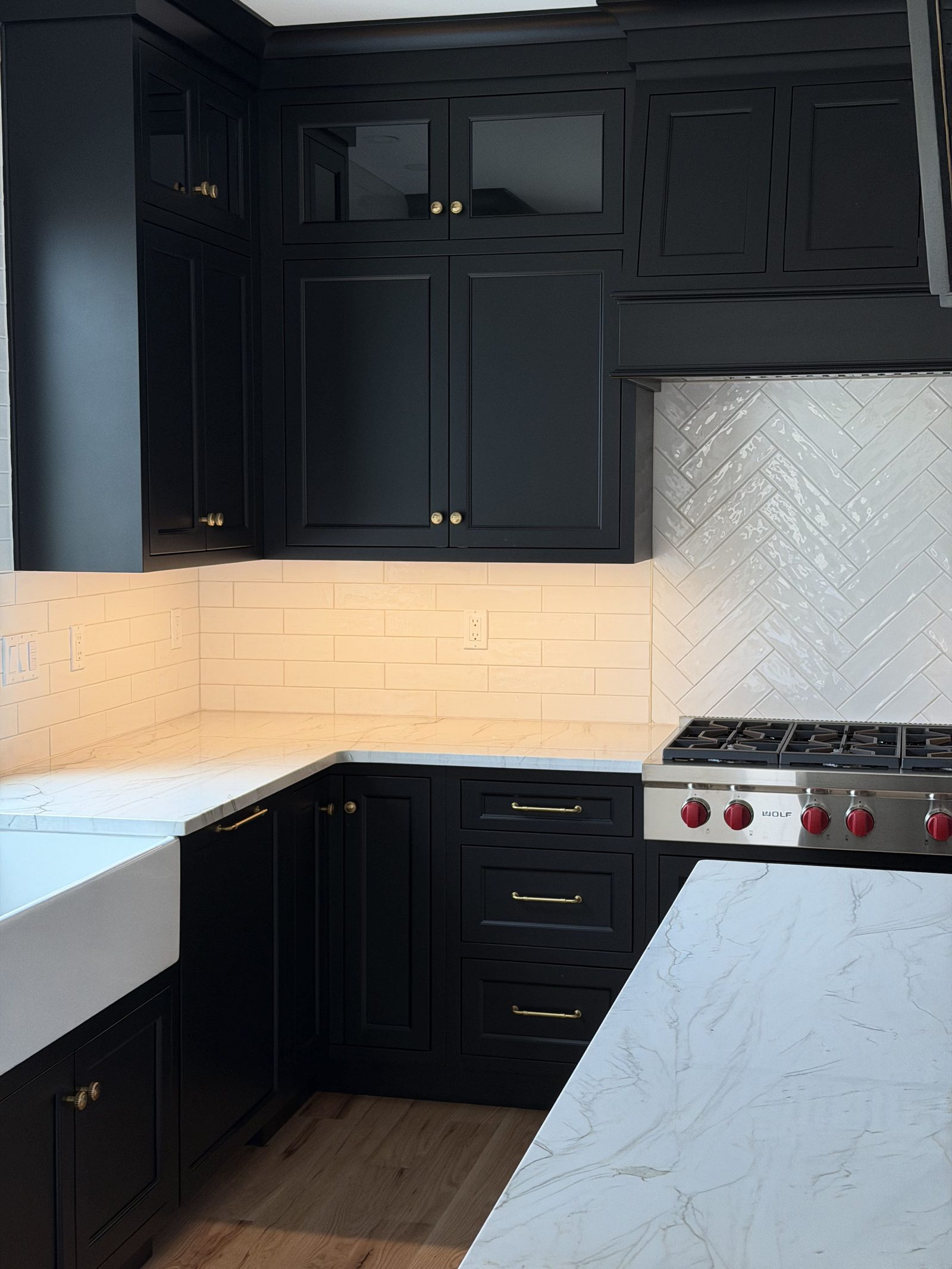 Kitchen with black shaker cabinets